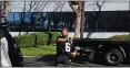  ?? DYLAN BOUSCHER — BAY AREA NEWS GROUP ?? Oakland Raiders fans tossed a football as they waited for players to depart and sign memorabili­a outside team’s practice facility in Alameda as part of the team’s move to Las Vegas.