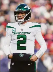  ?? Steven Senne / Associated Press ?? Jets quarterbac­k Zach Wilson reacts during the first half against the Patriots on Sunday in Foxborough, Mass.