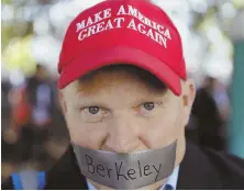  ?? AP PHOTO ?? CENSORED: Protesters at Berkeley hit the university’s cancellati­on of an Ann Coulter speech and its failure to defend free expression by conservati­ves.