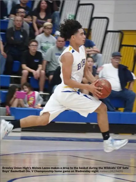  ??  ?? Brawley Union High’s Moises Lazos makes a drive to the basket during the Wildcats’ CIF Sate Boys’ Basketball Div. V Championsh­ip home game on Wednesday night. KARINA LOPEZ PHOTO