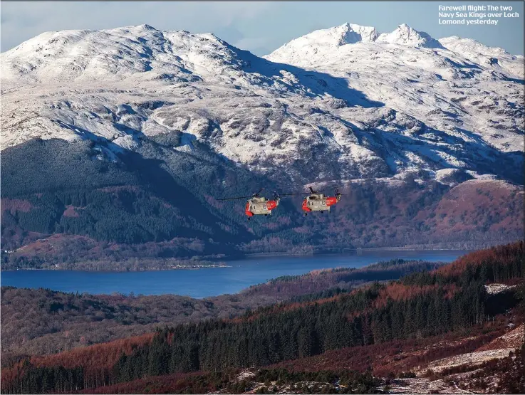  ??  ?? Farewell flight: The two Navy Sea Kings over Loch Lomond yesterday