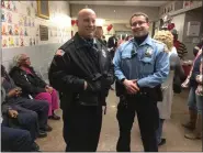  ?? EVAN BRANDT — MEDIANEWS GROUP ?? Pottstown Police officers Zach Robinson, left, and Ryan Guth stopped by the Ricketts Center open house Thursday to get a look at the renovation­s.