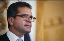  ?? ERIC ROJAS/AFP/GETTY IMAGES ?? Pedro Pierluisi holds a news conference after being sworn in as Governor of Puerto Rico in San Juan, Puerto Rico, on, August 2, 2019.