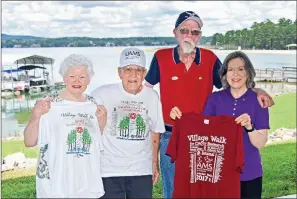  ?? STACI VANDAGRIFF/TRILAKES EDITION ?? Getting ready for the 17th annual Village Walk for Cancer Research are, front row, from left, Claire MacNeill, Ken MacNeill and Melanie Pederson, showing various T-shirts from the event, and Dick Antoine, back, who will act as master of ceremonies for this year’s fundraiser. The 5-mile walk will begin at the Balboa Pavilion on Lake Balboa in Hot Springs Village.