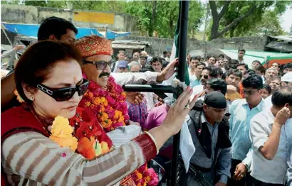  ?? PTI ?? Rashtriya Lok Dal candidate from Fatehpur Sikri Amar Singh during an election roadshow with party leader and actress Jaya Prada in Fatehpur Sikri on Monday. —