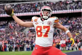 ?? (AP Photo/Alex Brandon) ?? Kansas City Chiefs tight end Travis Kelce (87) celebrates his touchdown against the Baltimore Ravens during the first half of Sunday’s AFC Championsh­ip game in Baltimore.
