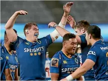  ?? GETTY IMAGES ?? Otago players celebrate their upset victory against Auckland at Eden Park, only their second win at the venue in 42 years.