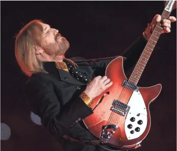  ?? TIMOTHY A. CLARY, AFP/GETTY IMAGES ?? Tom Petty plays the Super Bowl XLII halftime show on Feb. 3, 2008.