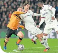  ??  ?? Hull’s Jarrod Bowen takes on the Chelsea defence