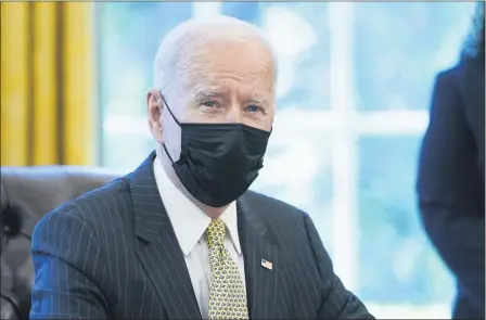  ?? EVAN VUCCI — THE ASSOCIATED PRESS ?? President Joe Biden speaks before signing the PPP Extension Act of 2021, in the Oval Office of the White House March 30, in Washington.