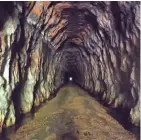  ?? CHELSEY LEWIS/MILWAUKEE JOURNAL SENTINEL ?? Workers used dynamite, hand tools, horses, mules and oxen to build this tunnel for the Chicago and North Western railroad in 1873. Today the tunnel is a path for cyclists and hikers as part of the Elroy-Sparta State Trail.