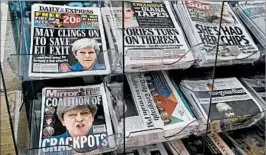  ?? TIM IRELAND/AP ?? British newspapers pound Prime Minister Theresa May, who said she will not step aside.