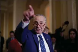  ?? AP PHOTO BY J. SCOTT APPLEWHITE ?? Senate Majority Leader Chuck Schumer, D-N.Y., speaks to reporters following a closed-door policy meeting on the Democrats’ lame duck agenda, at the Capitol in Washington, Tuesday, Nov. 15, 2022.