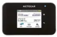  ?? Foto: Netgear ?? Ein Mobile Hotspot stellt über das Mobil funknetz eine Verbindung zum Internet her. Diese lässt sich dann mit mehreren Geräten nutzen. Geräte mit LTE Unter stützung, wie dieses von Netgear, gibt es ab rund 80 Euro.