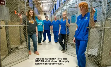  ??  ?? Jessica Gutmann (left) and SRCAS staff show off empty kennels (first time ever).