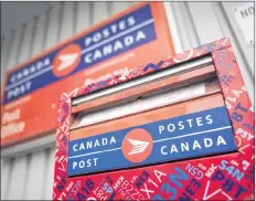  ?? CP PHOTO ?? A mail box is seen outside a Canada Post office in Halifax in 2016.