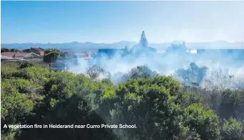  ?? ?? A vegetation fire in Heiderand near Curro Private School.