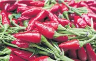  ?? JADA YUAN THE NEW YORK TIMES ?? Peppers at a market in Modena, Italy.