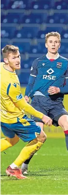  ??  ?? SAFE KEEPING: Zander Clark of St Johnstone saves a shot from Ross County’s Oli Shaw. Right: Craig Conway scores from the spot to earn the Perth men a draw in Dingwall.