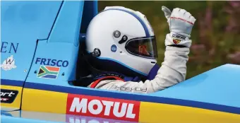  ?? Photo: Rob Till ?? André Bezuidenho­ut gives a thumbs up behind the wheel of his 2007 Gould GR55-3.