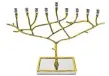  ??  ?? Classic Touch Tevy Gold Menorah, $176, bedbathand­beyond.ca