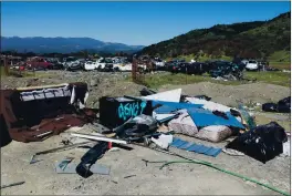  ??  ?? This illegal dump site is at Short Creek and Highway 162 in Covelo.