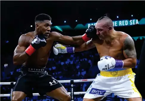  ?? (PA) ?? Anthony Joshua, left, is expected to return to the ring early next year