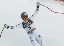  ?? Christophe Pallot/Agence Zoom, Getty Images ?? Vonn hits the finish line for the last time, earning a bronze medal Sunday in the downhill at the world championsh­ips in Are, Sweden.