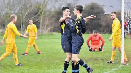  ?? Pic: Wynne Evans ?? Bryngwran Bulls celebrate a goal against Mynydd Tigers.