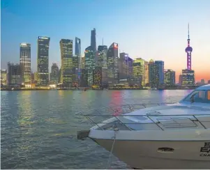  ?? — Jiang Xiaowei ?? Lujiazui, the commercial and financial center of Shanghai, plans to set up the Global Asset Management Associatio­n of Lujiazui in the first half of this year.