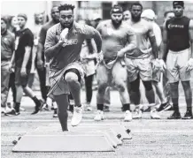  ?? THE ASSOCIATED PRESS ?? Derek Barnett competes during Tennessee’s pro day Friday in Knoxville. Although Barnett’s 40-yard dash times of 4.88 at the NFL combine and 4.9 during pro day aren’t among the best for defensive ends in this year’s draft class, he has still been listed...