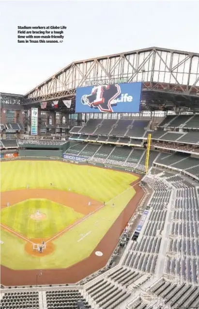  ?? AP ?? Stadium workers at Globe Life Field are bracing for a tough time with non-mask-friendly fans in Texas this season.