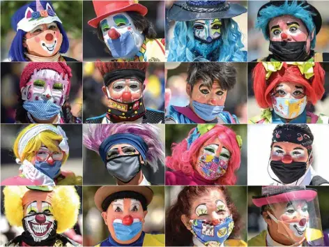  ??  ?? This combinatio­n of pictures created on April 30, 2020 shows clowns wearing face masks during a protest to demand Mexican government aid, as they have been unable to work on the streets for the past month due to restrictio­ns to prevent the spread of the novel coronaviru­s COVID-19 in Mexico City.—AFP
