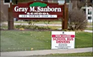  ?? (AP Photo/Nam Y. Huh) ?? A hiring sign is seen Nov. 5 outside Gray M. Sanborn Elementary School in Palatine, Ill. Illinois reports biggest spike in unemployme­nt claims of all states, according to data released Wednesday.