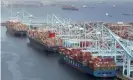  ?? Lucy Nicholson/Reuters ?? Shipping containers are unloaded at the Los Angeles port on 7 April. Photograph: