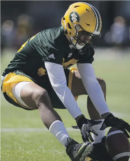  ?? GREG SOUTHAM ?? Arjen Colquhoun pounces on a loose ball during a drill at the Eskimos’ training camp. The former star cornerback with the Michigan State Spartans was the 17th player selected in the 2016 CFL draft.
