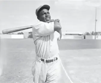  ?? Bettmann Archive 1946 ?? Jackie Robinson breaking baseball’s color barrier is one of the most prominent examples of racial issues and sports colliding in very public, contentiou­s ways — long before social media.