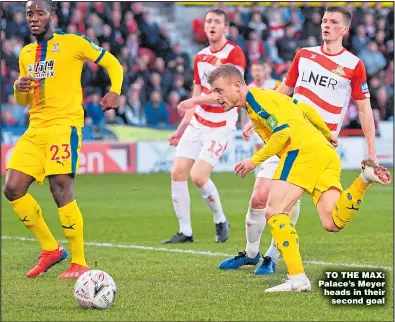  ?? Pictures: LAURENCE GRIFFITHS ?? TO THE MAX: Palace’s Meyer heads in their second goal