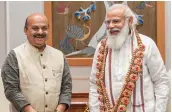  ?? — PTI ?? Prime Minister Narendra Modi with Karnataka’s new chief minister B.S. Bommai in New Delhi on Friday.