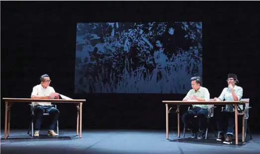  ??  ?? The Baling performers ( from left) Imri nasution, Fahmi Fadzil and Anne James in a tense scene from the documentar­y play. The show allows the audience to observe and interpret for themselves what had been discussed in the Baling Talks held in 1955. —...