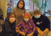  ?? MIRA ROSENBLATT VIA THE NEW YORK TIMES ?? Mira Rosenblatt, center, with staff members at Mount Sinai Brooklyn, including Sylvie Jean Baptiste, left, and Kristine Ortiz, in the gray sweater.