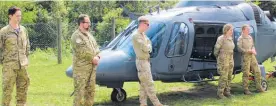  ?? Photo / David Haxton ?? The crew of the A109 chopper at Te Rā School.