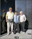  ??  ?? Bill Shugarts, left, Dao Minh Xuyen (former Viet Cong soldier) and Retired U. S. Army Command Sergeant Major Frank meet at the Vietnam Veterans Memorial in Washington, DC.