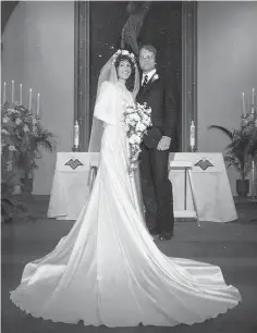  ?? Courtesy photo ?? below left
Ofelia DeYoung is photograph­ed with her new husband, Garry DeYoung, at their wedding in 1981 while wearing the same wedding dress her motherin-law Bettye DeYoung wore at her wedding 36 years earlier and would later be worn by her own...