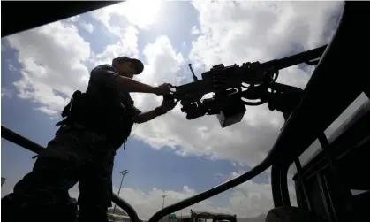  ?? Yemen. Photograph:Yahya Arhab/EPA ?? A Houthi soldier holds a machine gun on a vehicle while on patrol in Sana'a,