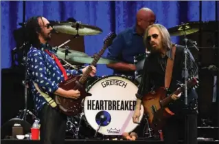  ?? RICK DIAMOND, GETTY ?? Tom Petty and the Heartbreak­ers performed in April in Nashville, Tennessee, during their 40th Anniversar­y Tour.