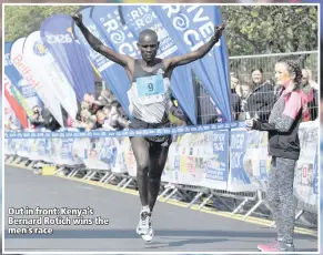  ??  ?? Out in front: Kenya’s Bernard Rotich wins the men’s race