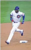  ?? | GETTY IMAGES ?? Cubs right fielder Jason Heyward circles the bases after hitting a solo home run in the second inning Tuesday against the Giants.