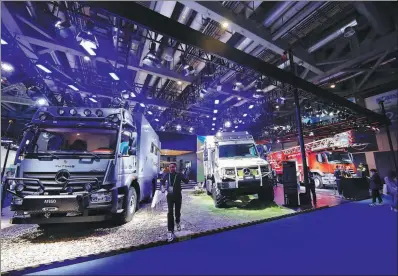  ?? PROVIDED TO CHINA DAILY ?? Daimler trucks are displayed during the 6th China Internatio­nal Import Expo in Shanghai in November.