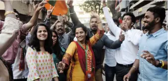  ?? —SHRIPAD NAIK ?? Elated BJP workers celebrate outside the BJP party office in Dadar after the results were declared on Thursday.